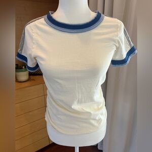 Free People t-shirt size medium. Great sporty design with fit details.